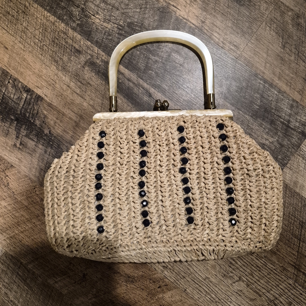 Elegant Tan Woven Handbag with Black Accents